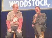  ?? TED SLOWIK/DAILY SOUTHTOWN ?? Moderator Rick Bellairs, left, and “Groundhog Day” screenwrit­er Danny Rubin discuss the film Thursday at the Woodstock Opera House in Woodstock, where the 1993 movie was filmed.