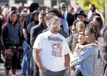  ?? Rich Pedroncell­i Associated Press ?? HUNDREDS of mourners attend Stephon Clark’s funeral Thursday at Bayside of South Sacramento Church. One by one, loved ones stood on the church stage to share memories of Clark, who left two sons and a fiancee.
