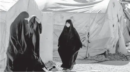  ?? BADERKHAN AHMAD/AP ?? Tension is climbing between hard-line IS supporters and foreign nationals at the Roj detention camp in northeast Syria.