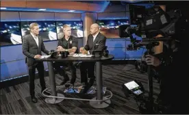  ?? A+E NETWORKS ?? Host Dan Abrams (left to right), guest analyst Sean Sticks Larkin and analyst Tom Morris Jr. on the set of Live PD.