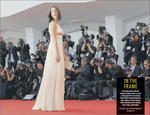  ??  ?? Actress and producer Victoria Hill arrives on the red carpet for the movie First Reformed during the 74th edition of the Venice Film Festival at the Venice Lido, Italy, yesterday.