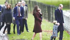  ??  ?? ENGLEFIELD: Britain’s Prince William (right) and Kate, the Duchess of Cambridge, center, with their children Prince George and Princess Charlotte, arrive to attend the morning Christmas Day service at St Mark’s Church in Englefield, England, with the...