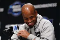  ?? MATT SLOCUM — THE ASSOCIATED PRESS ?? Saint Peter’s head coach Shaheen Holloway laughs during a news conference for the NCAA men’s college basketball tournament, Thursday at Wells Fargo Center.