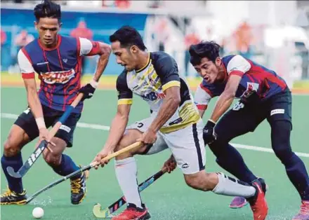  ??  ?? Midfielder Tengku Ahmad Tajuddin (centre) is among the key players that Malaysia will depend on to win their maiden gold at the Indonesia Asian Games next month.
