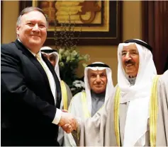  ??  ?? Pompeo (left) is welcomed by Emir Sheikh Sabah (right) in Kuwait City. — AFP photo