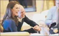  ??  ?? PRIVATE DATE: The Duke and Duchess of Cambridge meet police officers and staff at Hillsborou­gh Castle on their Northern Ireland tour.