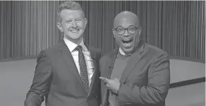  ?? COURTESY OF JEOPARDY! ?? Columbus native Brandon Anderson, right, laughs with “Jeopardy!” host Ken Jennings.