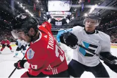  ?? DENNIS PAJOT/GETTY IMAGES ?? Defenceman Christian Ehrhoff of Team Europe, right, battles for the puck against forward John Tavares during final game action at the World Cup of Hockey. Ehrhoff is hoping his strong play will earn him a contract with an NHL team.