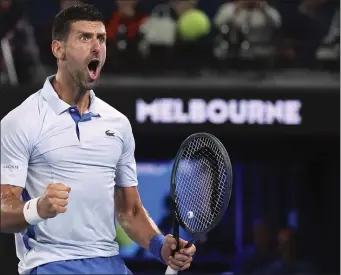  ?? ASANKA BRENDON RATNAYAKE — THE ASSOCIATED PRESS ?? Novak Djokovic reacts during his fourth round match against Adrian Mannarino at the Australian Open at Melbourne Park, Melbourne, Australia, on Sunday.