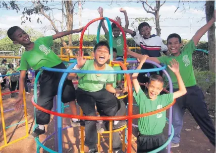  ??  ?? Happy days The pupils are delighted with the new play equipment courtesy of BSA