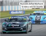  ?? ?? Reynolds defied Warhurst to take a win for Assetto