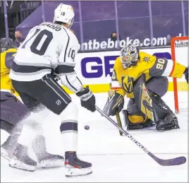  ??  ?? Goalkeeper Robin Lehner slides across the crease for a first-period save against the Kings. Lehner had 29 stops in the Golden Knights’ 4-3 victory at T-mobile Arena.