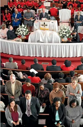  ?? AP ?? Several members in the congregati­on turn their backs on Democratic presidenti­al candidate and former New York City Mayor Mike Bloomberg while he speaks at Brown Chapel African Methodist Episcopal Church.