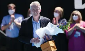  ?? Photograph: Quinn Rooney/Getty Images ?? Craig Tiley, CEO of Tennis Australia, presents flowers to Samantha Stosur on day four of the 2022 Australian Open at Melbourne Park.