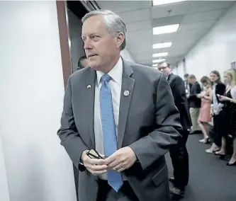  ?? THE ASSOCIATED PRESS FILES ?? House Freedom Caucus Chairman Rep. Mark Meadows, R-N.C., leaves a closed-door strategy session with House Speaker Paul Ryan of Wis., on March 28. Meadows’ group was the target of U.S. President Donald Trump’s tweets Thursday.