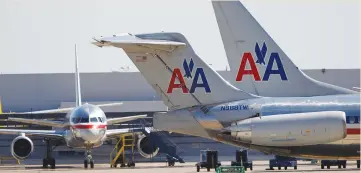  ?? (Tim Sharp/Reuters) ?? ‘WHATEVER THE new normal... it’s going to be more and more around self-service,’ said Sean Donohue, chief executive of Dallas-Forth Worth Internatio­nal Airport, which serves as the home base for American Airlines.