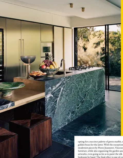  ??  ?? in The kitchen, verde alpi marble was used on The floor and central island