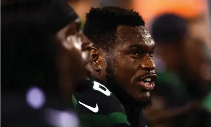  ??  ?? Kelechi Osemele of the New York Jets sits on the sidelines during a September game. Photograph:Emilee Chinn/Getty Images