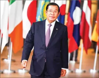  ?? EMMANUEL DUNAND/AFP ?? Prime Minister Hun Sen looks on as he arrives on Thursday for the 12th Asia-Europe Meeting (ASEM) at the European Council in Brussels.