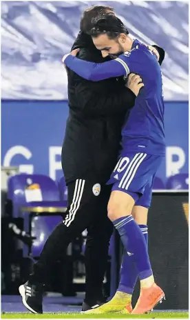  ?? PA ?? GIVE ME A HUG, BOSS: James Maddison celebrates with Brendan Rodgers on the touchline after his first goal against Brighton