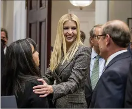  ?? ANDREW HARNIK — THE ASSOCIATED PRESS ?? Ivanka Trump, center, sent emails about government business from a personal email account. A spokesman for her lawayer said none contained classified informatio­n.