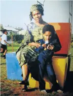  ??  ?? A young Tumi Morake and her mom.