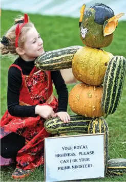  ?? Paul Nicholls ?? Ava Boswell, Jaxson Boswell and Malachite Williams, with pumpkin models of Prime Minister Rishi Sunak, King Charles III and Camilla, Queen Consort, at the Spookyard Halloween event at Over Farm Market near Gloucester, which runs until tomorrow