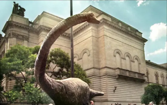  ?? Darrell Sapp/Post-Gazette ?? Visitors pass by Dippy the Dinosaur outside the Carnegie Museum of Natural History in July 2014. The four Carnegie Museums of Pittsburgh are to reopen June 29.