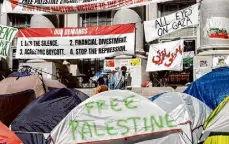  ?? Noah Berger/Special to the Chronicle ?? Tents and banners line a pro-Palestinia­n protest encampment Tuesday at UC Berkeley.