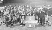  ?? BILL DALEY Special to the Miami Herald ?? American Heritage girls and coaches celebrate Friday night after winning the Class 5A state soccer championsh­ip at Spec Martin Stadium in DeLand.