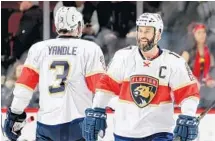  ?? ELSA/GETTY IMAGES ?? Captain Derek MacKenzie, right, says the Panthers cannot stumble into the playoffs and must earn their way in with improved play.