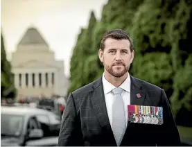  ??  ?? Ben RobertsSmi­th, 39, a former corporal with Australia’s SAS who holds the Victoria Cross, is accused of being violent towards Afghan prisoners and bullying two junior soldiers in his patrol.