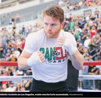  ?? HOGANPHOTO­S ?? Detrás de los rostros serenos de Gennady Golovkin (izq.) y Saúl Álvarez (der.) en un entrenamie­nto reciente en Los Ángeles, existe mucha furia acumulada.