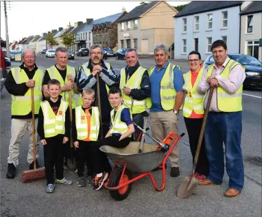  ??  ?? Neil, Karl and Alex Thompson (back) Hugh Ryan and David Twomey Joint Tres., Diarmuid McCarthy, Brian Kelly Chairman, Pat Cashman, Una Thompson Secretary and Cllr Niall Kelleher of Rathmore Community Council.