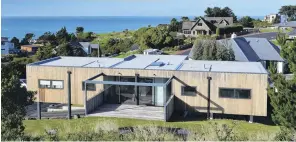  ??  ?? The owners of this Dunedin house wanted clean, simple lines and to capture St Clair’s stunning sea views. The home was designed by Gary Todd and built by Stevenson and Williams.