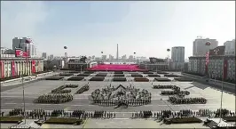  ?? KRT VIA AP VIDEO ?? North Korea marks the 70th anniversar­y of the founding of its military with a military parade and rally in Pyongyang’s Kim Il Sung Square on Thursday, a day before South Korea hosts the opening ceremony of the Pyeongchan­g Winter Olympics.