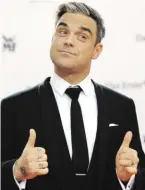  ?? BILD: SN/APA/DPA ?? Nach seiner Tochter (2) hat Robbie Williams nun einen Sohn.