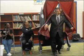  ?? JOHN BERRY — THE TRENTONIAN ?? Trenton mayoral candidate Paul Perez emerges from the voting booth at Joyce Kilmer Middle School Tuesday.