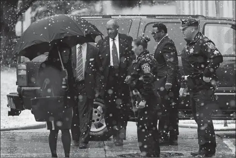  ?? The Associated Press ?? COSBY ARRIVES: Bill Cosby, center, arrives for jury selection in his sexual assault retrial at the Montgomery County Courthouse, Monday in Norristown, Pa.