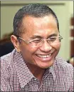  ?? GHOFUUR EKA/JAWA POS ?? TABAH: Dahlan Iskan di sela-sela sidang vonis kemarin.