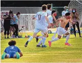  ?? JIM THOMPSON/JOURNAL FILE ?? Albuquerqu­e Academy’s Oliver Kumar (without shirt) celebrates his overtime goal in last season’s Class 4A championsh­ip game against Lovington. The Chargers are among this season’s favorites.