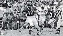  ?? THE ASSOCIATED PRESS FILE PHOTOS ?? Bears running back Gale Sayers, considered among the best open-field runners the game has ever seen, died Wednesday.
