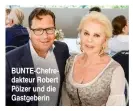  ??  ?? BUNTE-Chefredakt­eur Robert Pölzer und die Gastgeberi­n