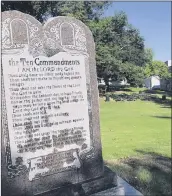  ?? JILL ZEMAN BLEED / AP ?? A 6-foot-tall, privately funded Ten Commandmen­ts monument is seen on the Arkansas Capitol grounds Tuesday in Little Rock after it was installed by workers two years after lawmakers approved it.