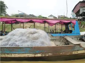  ??  ?? Fish net used for fishing in the Tonle Sap.