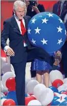  ??  ?? Having a ball: ex-president Bill Clinton kicks a balloon and, inset, Katy Perry