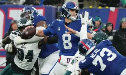  ?? Stadium. Photograph: Chris Pedota/USA Today Sports ?? New York Giants quarterbac­k Daniel Jones (8) passes the ball against the Philadelph­ia Eagles during their December game at MetLife