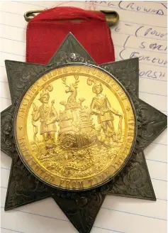  ?? Reader submitted/Tribune News Service ?? Is this star-shaped medal a stellar find?