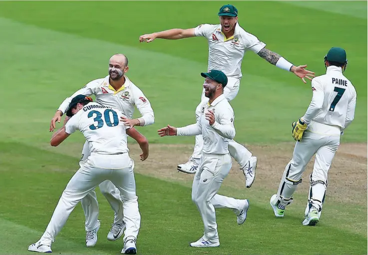 ?? Photo: Daily Mail ?? Aussies celebrate as Nathan Lyon celebrates the wicket of Ben Stokes as Australia cruised towards victory on the final day of the first Test at Edghaston.
