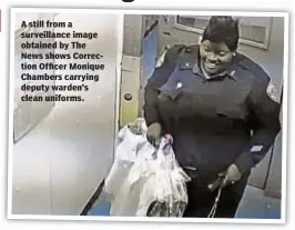  ??  ?? A still from a surveillan­ce image obtained by The News shows Correction Officer Monique Chambers carrying deputy warden’s clean uniforms.
